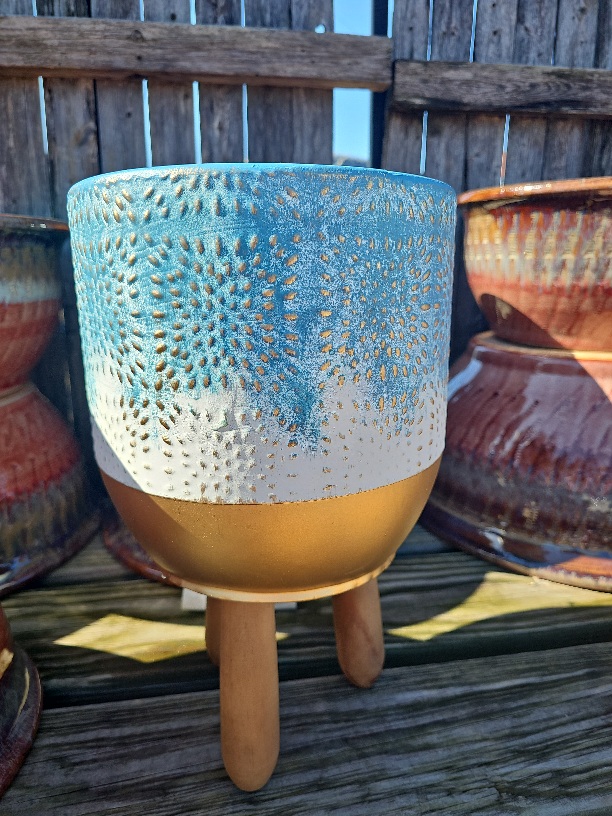 a blue outdoor pot cover